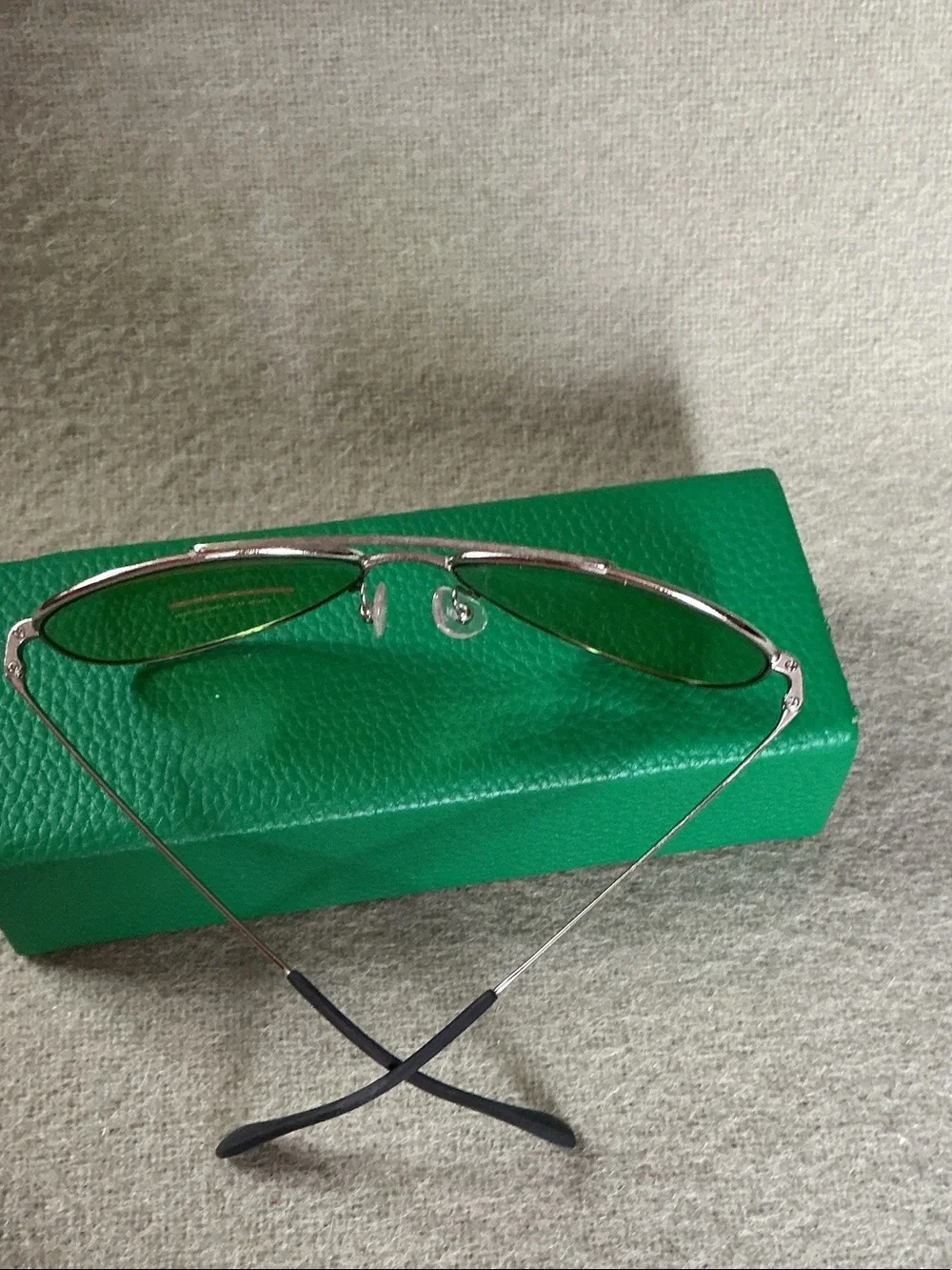 Prada Silver Frame Sunglasses with Green Lenses